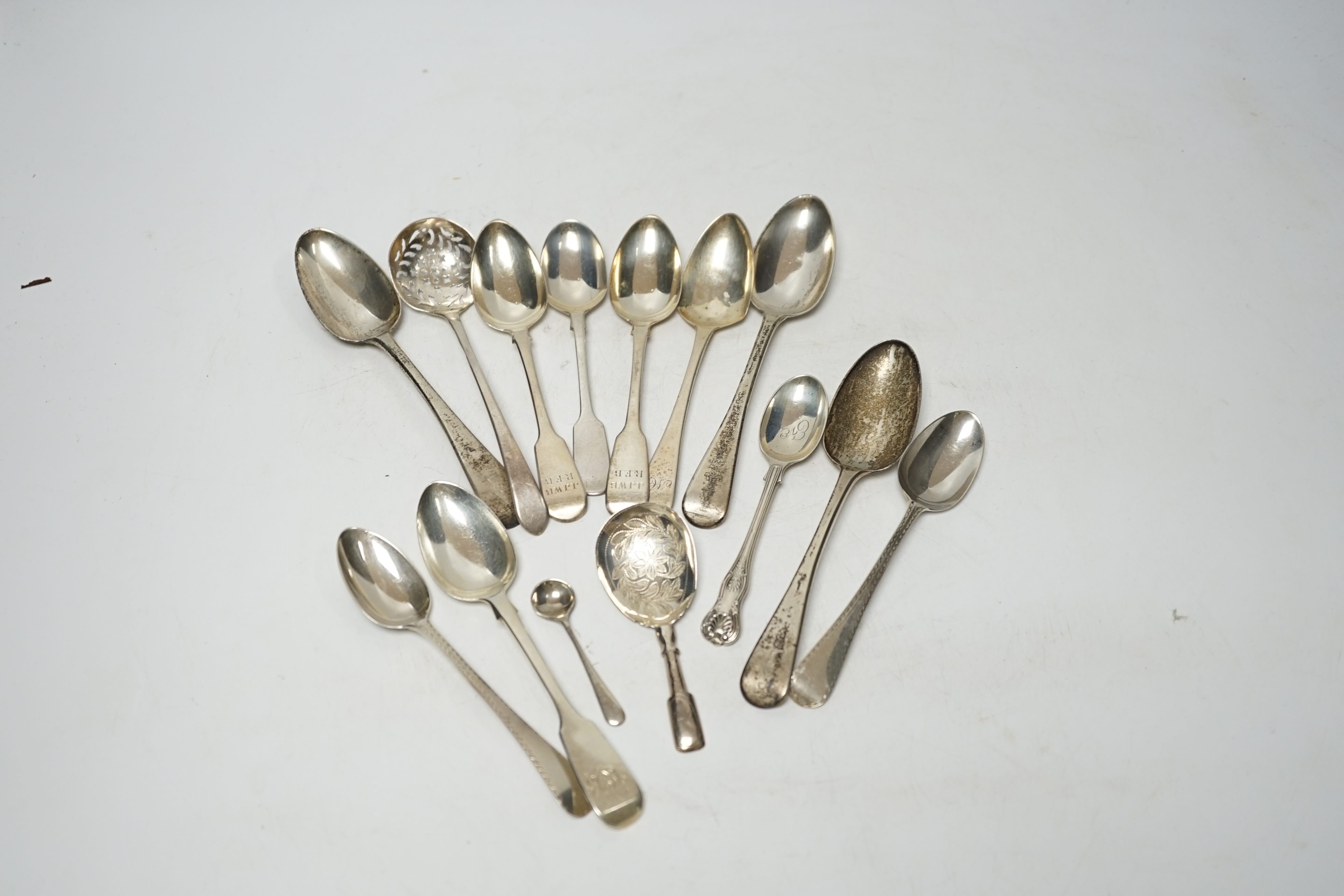 A quantity of assorted 18th century and later flatware, mainly teaspoons including a set of six base mark teaspoons, caddy spoon, etc, 32.7oz and eight plated spoons.